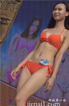 知性甜美橘色比基尼泳装美女。